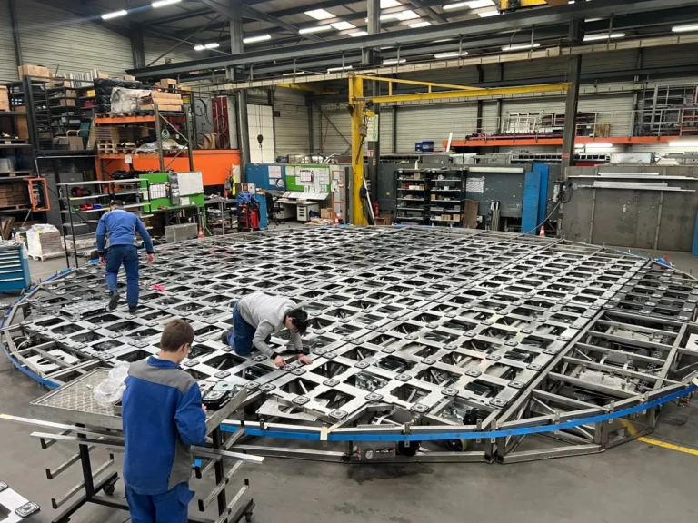 Workshop assembly of the circular frame that carries the LED tiles of the circus ring
