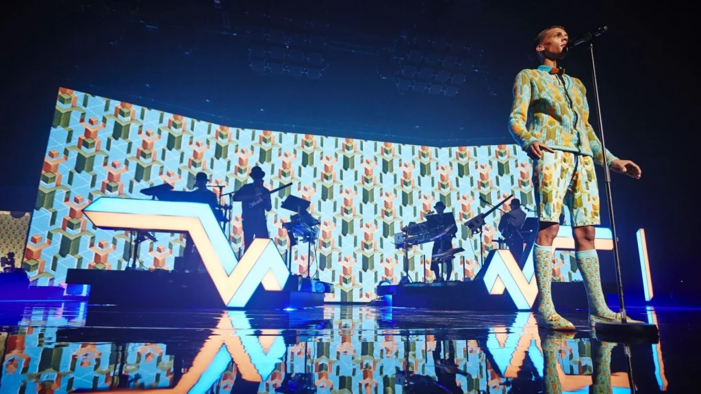 Stromae concert in front of an LED wall