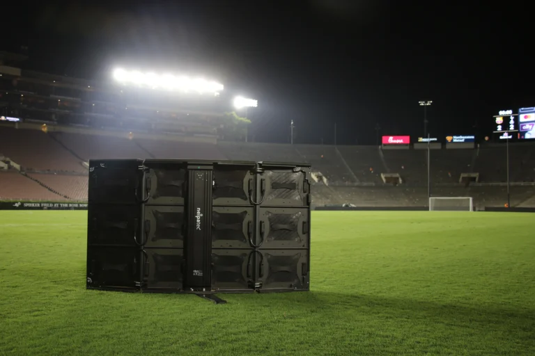 LED screen perimeter ICC – NEIPATEC perimeter LED system module standing on the pitch of an empty stadium at night