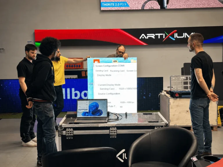 Artixium experts running a technical LED display training session for partners